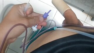 Big dick under control to inject the fortifying serum that will leave the boy with a super erection.
